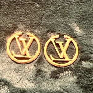 Louis Vuitton Hoops in Gold-color Logo Earrings